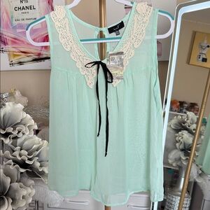 love J Light Green Blouse with Cream Lace and Black Bow
